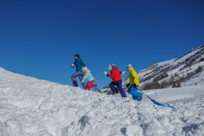 Man skiing on snow covered mountain