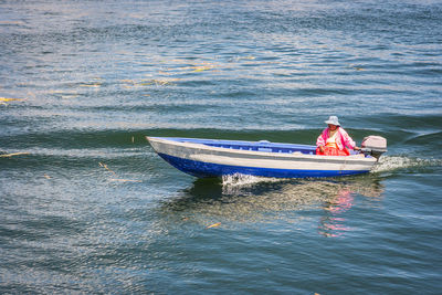 Boat sailing in sea