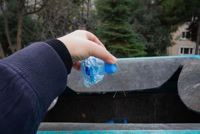 Close-up of hand holding water