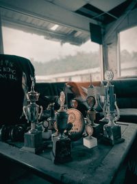 Close-up of old bottles on table