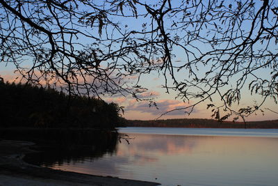 Scenic view of calm sea at sunset