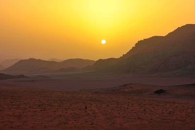 Scenic view of mountains at sunset