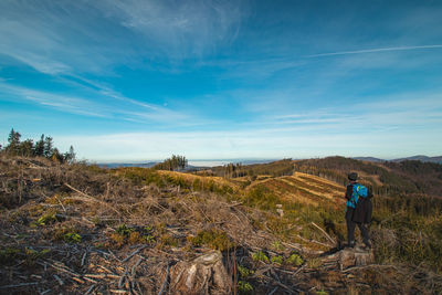 Traveller with backpack on his back walks towards his unforgettable experiences in czech republic