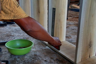 High angle view of person working on wood