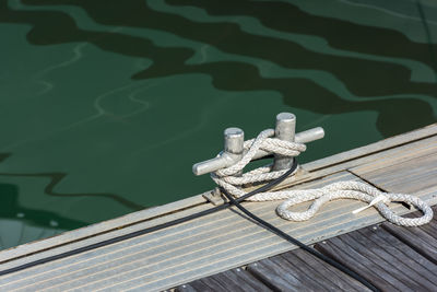 High angle view of ropes on pier