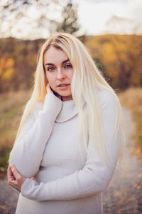 Portrait of young woman looking away