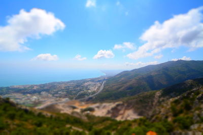 Scenic view of landscape against cloudy sky