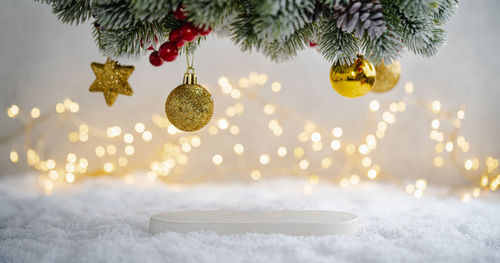 Close-up of christmas decorations on snow