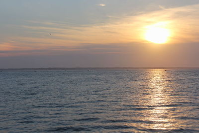 Scenic view of sea at sunset