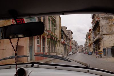 Cars on road seen through car window