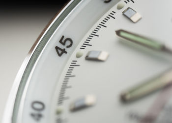 High angle view of clock on white background