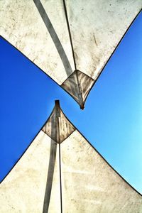 Low angle view of built structure against blue sky