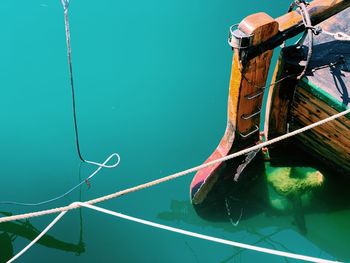 High angle view of rope tied on boat