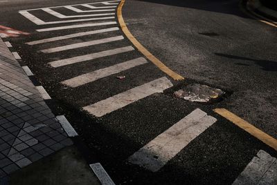 High angle view of zebra crossing on road