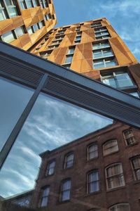 Low angle view of buildings against sky