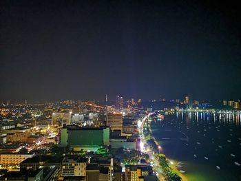 High angle view of illuminated city buildings against clear sky,pataya