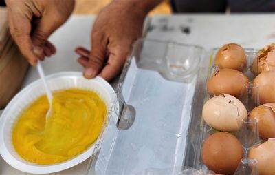 High angle view of person preparing food