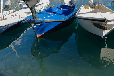 High angle view of fishing boats moored in sea