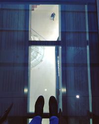 Low section of woman in bathtub