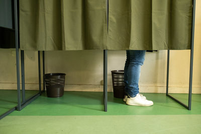 Low section of man standing on floor