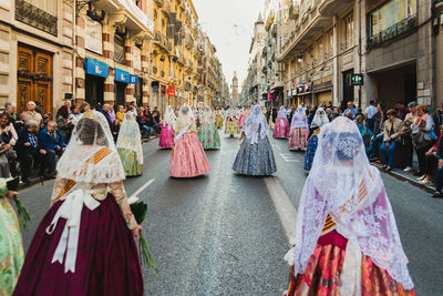 People on street in city