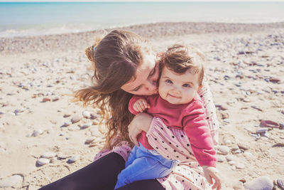 Mother and daughter at beach