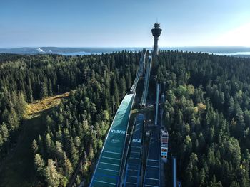 High angle view of trees and buildings against sky