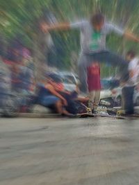 Blurred motion of woman in shopping mall