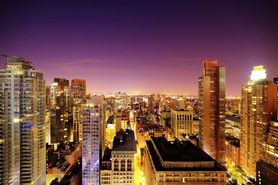 Illuminated cityscape at night