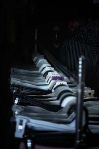 Close-up of coathangers on rack