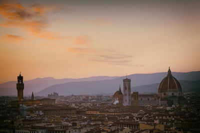 High angle view of townscape against sky during sunset