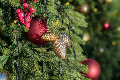 Christmas and new year holidays background. christmas tree decorated with balls and garlands