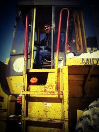 Portrait of man working in bus