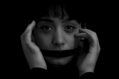 Close-up portrait of mid adult man