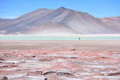 Scenic view of desert against mountain