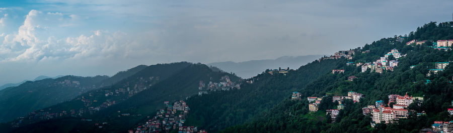 High angle view of buildings in city against sky