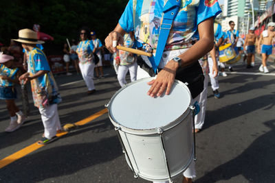 Members of cultural percussion groups are seen playing during fuzue, pre-carnival 