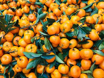 Full frame shot of oranges at market stall