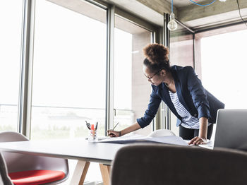 Man working on table at home