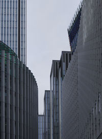 Low angle view of modern buildings against clear sky