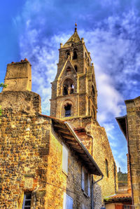 Low angle view of old building against sky