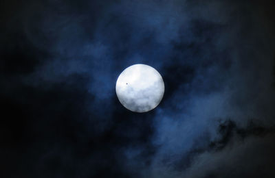 Low angle view of moon against sky