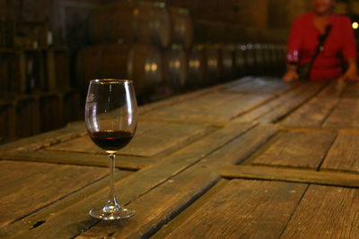 Close-up of wine glass on table 