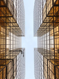 Low angle view of glass and metal building