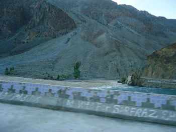 View of river flowing through mountains