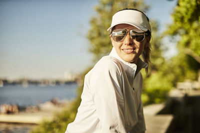 Outdoor portrait of an athletic woman.