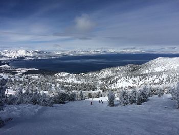 Scenic view of landscape against sky during winter