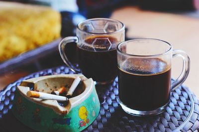 Close-up of coffee cup on table