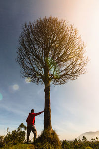 A man standing at trees