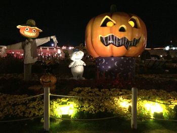 Low angle view of lanterns hanging at night